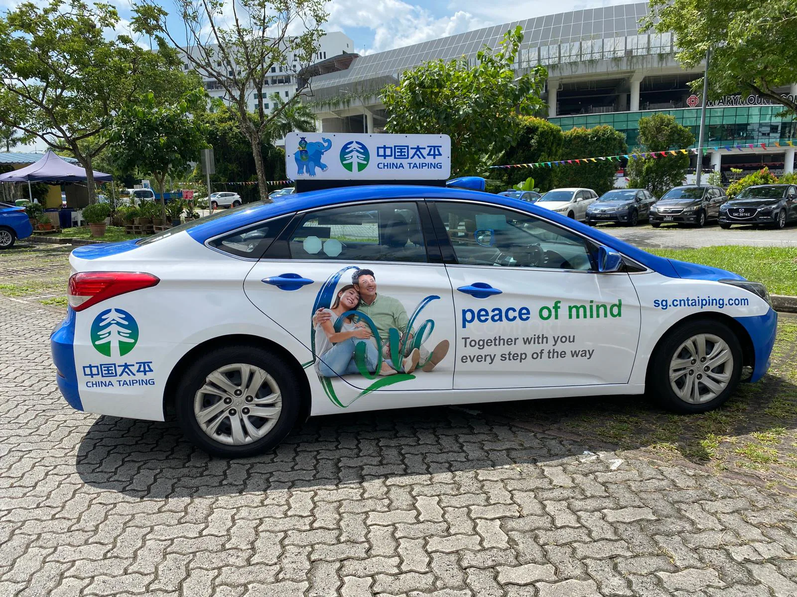 China Taiping peace of mind livery on a taxi
